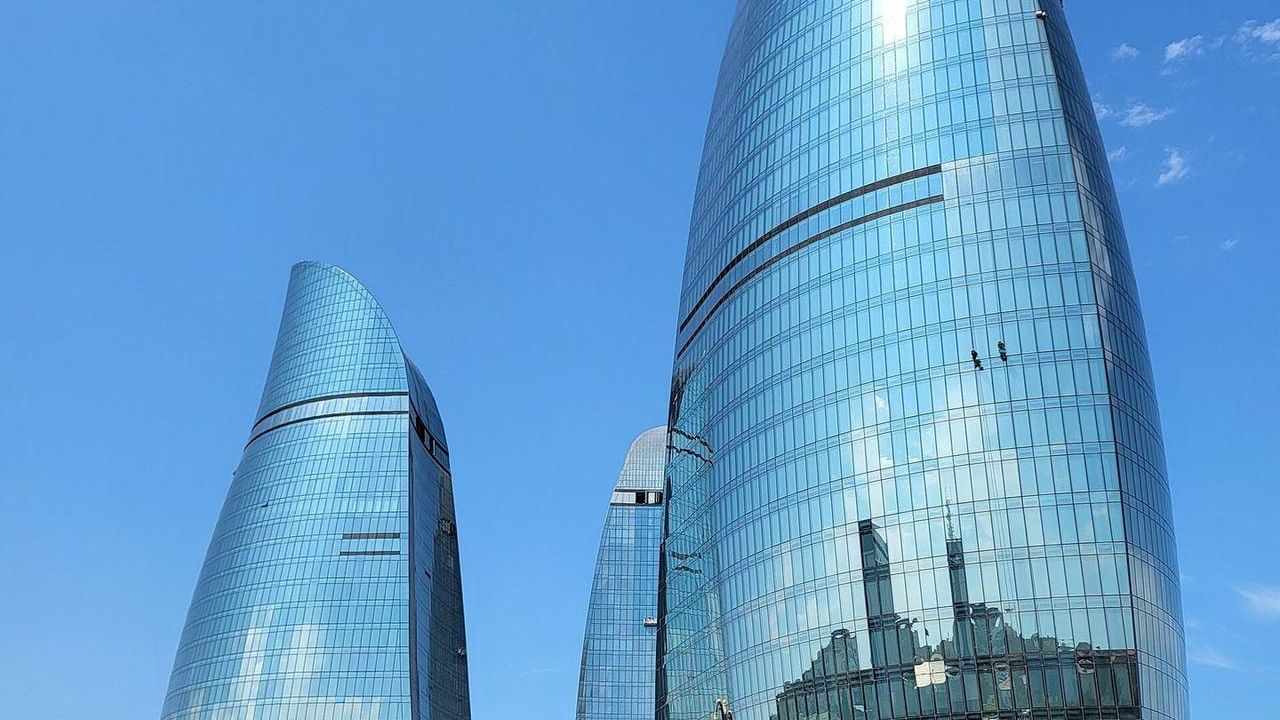 Flame Towers skyscrapers on the Baku skyline above the Caspian Sea boulevard, Azerbaijan