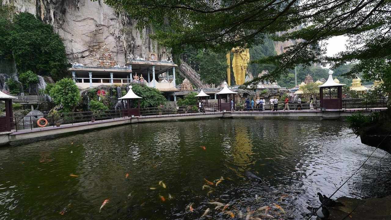 Batu Caves temple entrance and limestone cliff near Kuala Lumpur, Malaysia