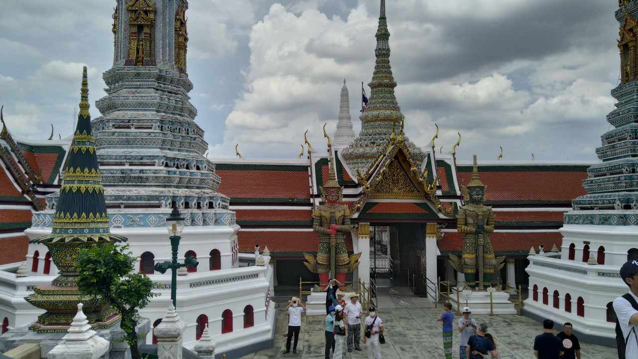 Grand Palace in Bangkok with golden spires and ornate Thai temple roofs — Thailand visa guide